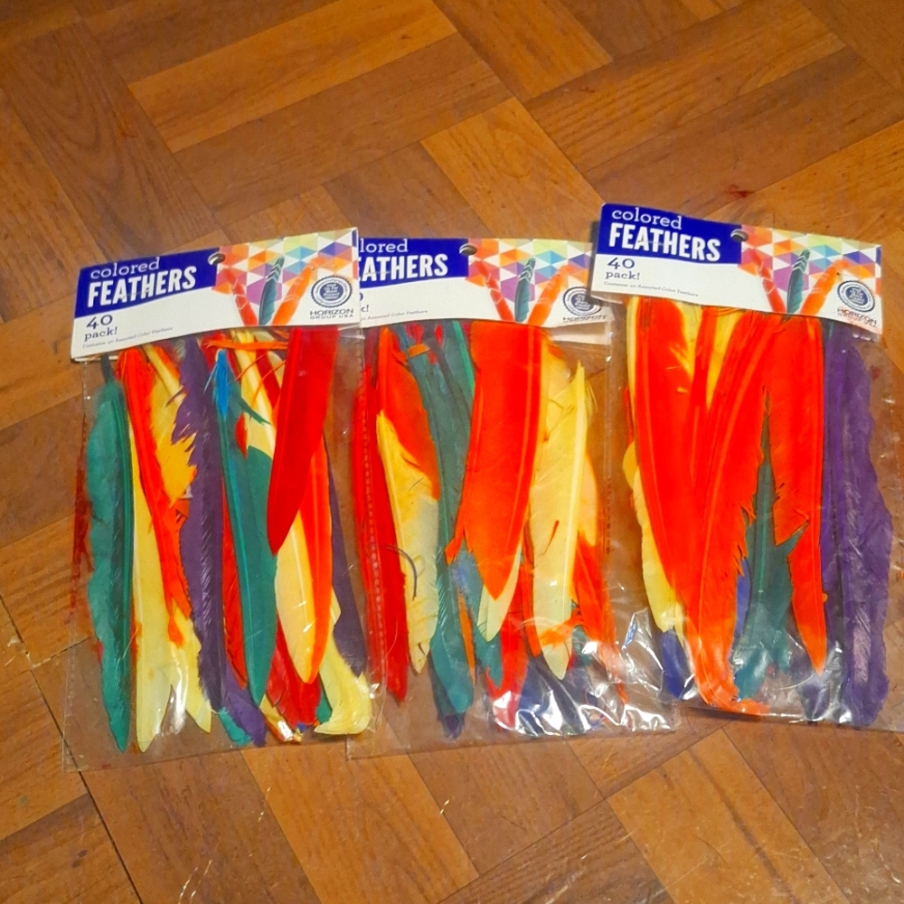 Colored feathers3 packs of colored feathers